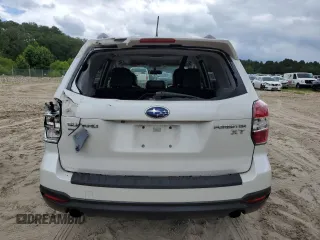 2015 Subaru Forester XT Touring with VIN JF2SJGUCXFH820469, listed as a Copart auction lot 62777665 with 90,389 mi miles and Salvage title. Bid and sale history available at DreamBid. Image 6.