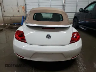2013 Volkswagen Beetle 2.5L w/Sound/Nav z VIN 3VW5P7AT7DM811619, wystawiony jako Copart lot #60331015 z przebiegiem 115 532 mil mil oraz Szkoda całkowita • Salvage title. Historia ofert i sprzedaży dostępna na DreamBid. Obrazek 6.