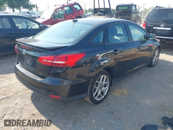 2015 Ford Focus SE z VIN 1FADP3F25FL284097, wystawiony jako IAAI lot #42553323 z przebiegiem 139 647 mil mil oraz . Historia ofert i sprzedaży dostępna na DreamBid. Obrazek 4.