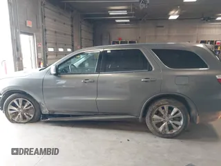 2012 Dodge Durango R/T z VIN 1C4SDJCT2CC169951, wystawiony jako IAAI lot #42012202 z przebiegiem 278 670 mil mil oraz . Historia ofert i sprzedaży dostępna na DreamBid. Obrazek 14.