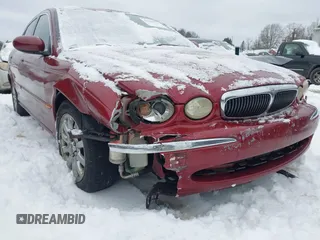 2003 Jaguar X-Type 2.5L Manual z VIN SAJEA51D63XC89273, wystawiony jako IAAI lot #41298544 z przebiegiem 124 400 mil mil oraz . Historia ofert i sprzedaży dostępna na DreamBid. Obrazek 6.