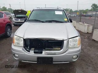 2004 GMC Envoy SLT z VIN 1GKDT13S742130352, wystawiony jako IAAI lot #42355072 z przebiegiem 170 355 mil mil oraz . Historia ofert i sprzedaży dostępna na DreamBid. Obrazek 11.