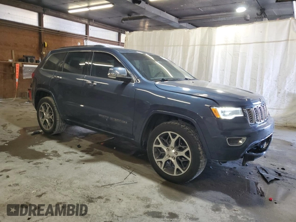 2020 Jeep Grand Cherokee Overland with VIN 1C4RJFCG4LC231616, listed as a Copart auction lot 49303645 with 66,043 mi miles and Salvage Title. Bid and sale history available at DreamBid. Image 4.