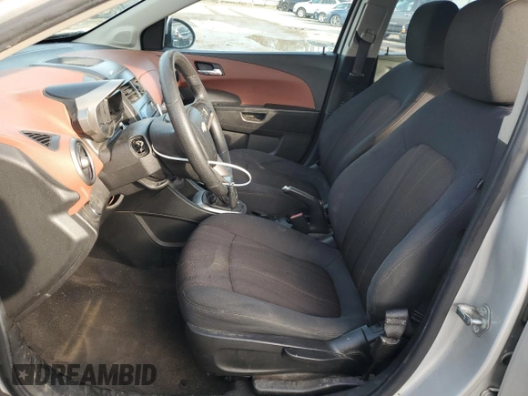 2012 Chevrolet Sonic LT with VIN 1G1JD5SH0C4231267, listed as a Copart auction lot 82848544 with 115,159 mi miles and Salvage title. Bid and sale history available at DreamBid. Image 7.
