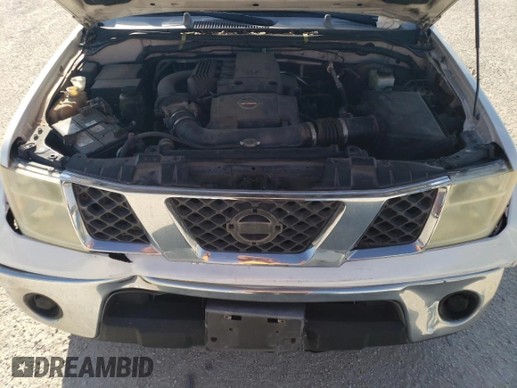 2006 Nissan Frontier SE with VIN 1N6AD06U16C404027, listed as a Copart auction lot 74909184 with 200,572 mi miles and Salvage title. Bid and sale history available at DreamBid. Image 13.