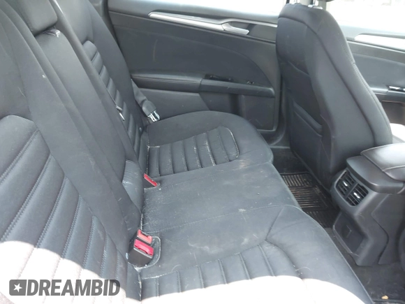 2015 Ford Fusion SE Hybrid z VIN 3FA6P0LU3FR163695, wystawiony jako IAAI lot #42428393 z przebiegiem 237 835 mil mil oraz . Historia ofert i sprzedaży dostępna na DreamBid. Obrazek 8.