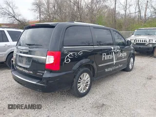 2013 Chrysler Town & Country Limited with VIN 2C4RC1GG2DR595808, listed as a IAAI auction lot 41946685 with 185,579 mi miles. Bid and sale history available at carsss.com. Image 4.