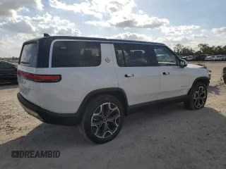 2023 Rivian R1S Adventure with VIN 7PDSGBBA3PN017791, listed as a Copart auction lot 82397374 with 20,733 mi miles and Salvage Title. Bid and sale history available at carsss.com. Image 3.