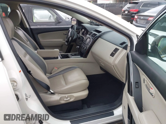 2011 Mazda CX-9 Touring with VIN JM3TB2CA4B0317250, listed as a IAAI auction lot 42103000 with 90,024 mi miles and . Bid and sale history available at DreamBid. Image 5.