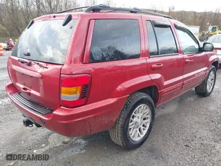 2004 Jeep Grand Cherokee Limited with VIN 1J4GW58S94C299311, listed as a IAAI auction lot 41912467 with 55,736 mi miles. Bid and sale history available at carsss.com. Image 4.