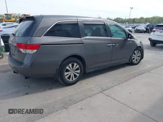 2014 Honda Odyssey EX-L with VIN 5FNRL5H67EB106183, listed as a IAAI auction lot 42210600 with 196,166 mi miles and . Bid and sale history available at DreamBid. Image 4.