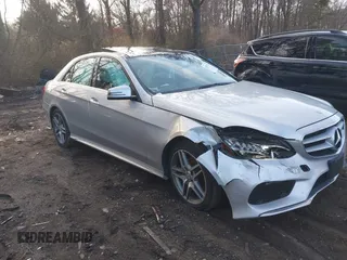 2014 Mercedes-Benz E 350 Luxury with VIN WDDHF8JB2EB043563, listed as a IAAI auction lot 41887276 with 73,003 mi miles and . Bid and sale history available at DreamBid. Image 13.