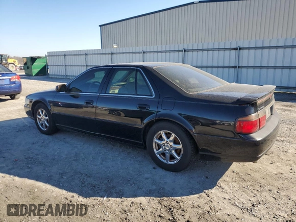 2000 Cadillac Seville Touring STS z VIN 1G6KY5495YU177352, wystawiony jako Copart lot #86020444 z przebiegiem Nie podano mil oraz Szkoda całkowita • Salvage title. Historia ofert i sprzedaży dostępna na DreamBid. Obrazek 2.