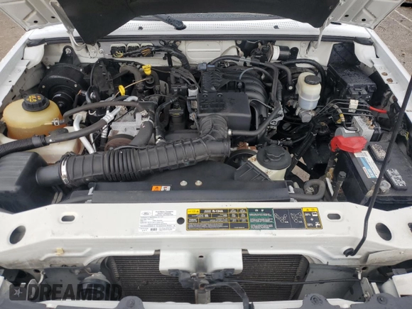 2011 Ford Ranger XL with VIN 1FTKR1ED7BPA74834, listed as a Copart auction lot 87236604 with 169,644 mi miles and Salvage title. Bid and sale history available at DreamBid. Image 11.
