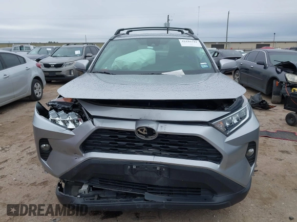 2021 Toyota RAV4 XLE with VIN 2T3W1RFVXMC148125, listed as a IAAI auction lot 41645741 with 66,047 mi miles. Bid and sale history available at carsss.com. Image 13.