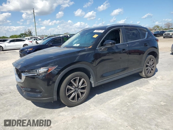 2018 Mazda CX-5 Touring with VIN JM3KFACM0J1408075, listed as a Copart auction lot 50866735 with Not Provided miles and Salvage Title. Bid and sale history available at carsss.com. Image 1.