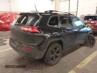 2016 Jeep Cherokee Latitude with VIN 1C4PJMCS3GW197351, listed as a IAAI auction lot 40967948 with 145,051 mi miles and . Bid and sale history available at carsss.com. Image 4.