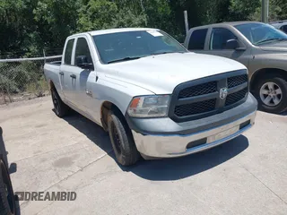 2015 Ram 1500 Tradesman with VIN 1C6RR6FG7FS542799, listed as a IAAI auction lot 42838716 with 166,411 mi miles and . Bid and sale history available at DreamBid. Image 1.