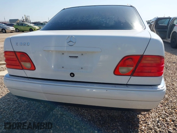 1999 Mercedes-Benz E-Class with VIN WDBJF65H6XA867166, listed as a IAAI auction lot 42017341 with 89,841 mi miles. Bid and sale history available at carsss.com. Image 16.