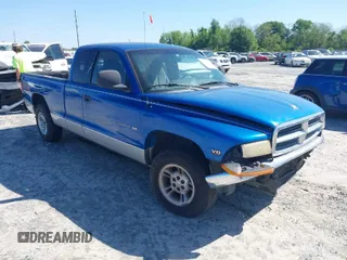 1999 Dodge Dakota SLT z VIN 1B7GL22X7XS167952, wystawiony jako IAAI lot #41974299 z przebiegiem 319 733 mil mil oraz . Historia ofert i sprzedaży dostępna na DreamBid. Obrazek 1.