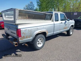 1987 Ford Ranger with VIN 1FTCR15T5HPB40124, listed as a IAAI auction lot 42177557 with 7,957 mi miles. Bid and sale history available at carsss.com. Image 4.