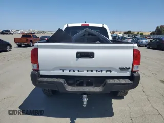 2016 Toyota Tacoma SR with VIN 5TFRX5GN9GX058319, listed as a Copart auction lot 55653195 with 177,658 mi miles and Salvage title. Bid and sale history available at DreamBid. Image 6.