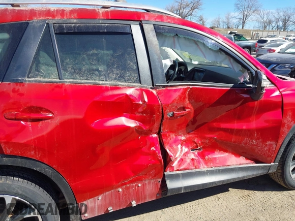 2016 Mazda CX-5 Grand Touring with VIN JM3KE4DY0G0709563, listed as a IAAI auction lot 41886956 with 156,769 mi miles. Bid and sale history available at carsss.com. Image 6.
