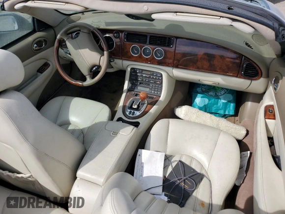 2006 Jaguar XK8 with VIN SAJDA42CX62A45610, listed as a Copart auction lot 75286034 with Not Provided miles and Salvage Title. Bid and sale history available at carsss.com. Image 8.
