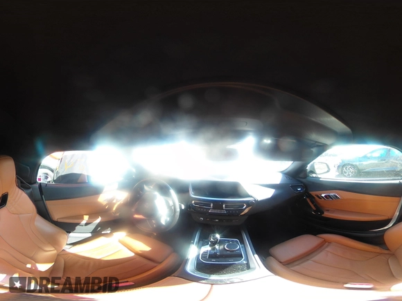 2020 BMW Z4 sDrive30i z VIN WBAHF3C09LWW54993, wystawiony jako IAAI lot #41757841 z przebiegiem Nie podano mil oraz . Historia ofert i sprzedaży dostępna na DreamBid. Obrazek 21.