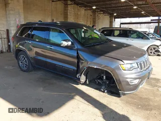 2021 Jeep Grand Cherokee 80th Anniversary z VIN 1C4RJFBG1MC828760, wystawiony jako IAAI lot #42029388 z przebiegiem 51 287 mil mil oraz . Historia ofert i sprzedaży dostępna na DreamBid. Obrazek 1.