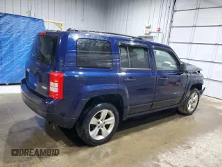 2014 Jeep Patriot Latitude with VIN 1C4NJRFB0ED852882, listed as a Copart auction lot 49674915 with 130,367 mi miles and Salvage title. Bid and sale history available at DreamBid. Image 3.