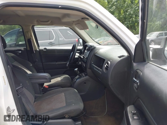 2014 Jeep Patriot Altitude with VIN 1C4NJPBA8ED504989, listed as a IAAI auction lot 42284403 with 196,922 mi miles and . Bid and sale history available at DreamBid. Image 5.