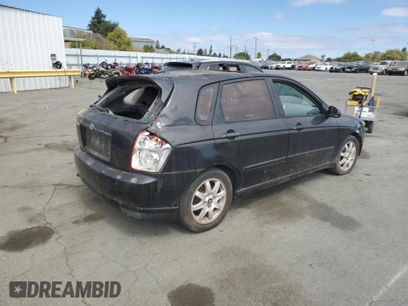 2005 Kia Spectra with VIN KNAFE162655074198, listed as a Copart auction lot 71015104 with 200,819 mi miles and Salvage Title. Bid and sale history available at DreamBid. Image 3.
