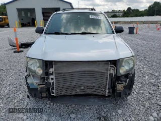 2011 Ford Escape XLT z VIN 1FMCU9DG8BKA85654, wystawiony jako Copart lot #64616925 z przebiegiem 188 948 mil mil oraz Szkoda całkowita • Salvage title. Historia ofert i sprzedaży dostępna na DreamBid. Obrazek 5.