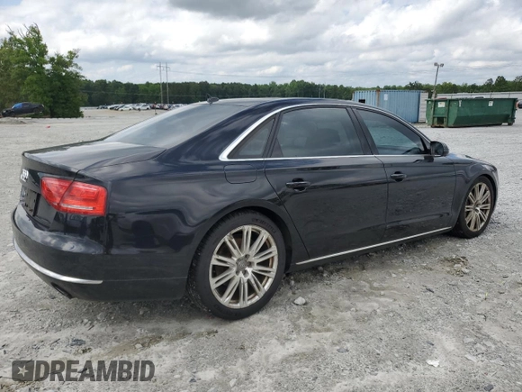 2014 Audi A8 3.0T z VIN WAURGAFD5EN007035, wystawiony jako Copart lot #58578545 z przebiegiem 199 696 mil mil oraz Tytuł czysty. Historia ofert i sprzedaży dostępna na DreamBid. Obrazek 3.