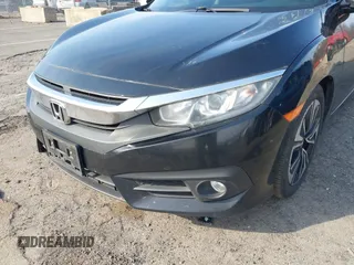 2016 Honda Civic Sedan EX-L with VIN 2HGFC1F77GH636904, listed as a IAAI auction lot 42090609 with 176,968 mi miles. Bid and sale history available at carsss.com. Image 6.