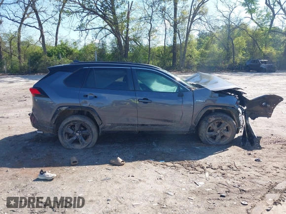 2021 Toyota RAV4 Hybrid XSE with VIN 2T3E6RFV2MW017668, listed as a IAAI auction lot 42008581 with Not provided miles and . Bid and sale history available at DreamBid. Image 14.