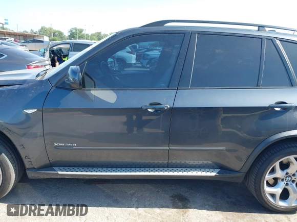 2012 BMW X5 35d with VIN 5UXZW0C51CL669957, listed as a IAAI auction lot 42230292 with 102,305 mi miles and . Bid and sale history available at DreamBid. Image 14.
