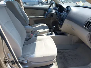 2005 Kia Spectra LX z VIN KNAFE122355118194, wystawiony jako IAAI lot #42454058 z przebiegiem 125 456 mil mil oraz . Historia ofert i sprzedaży dostępna na DreamBid. Obrazek 5.