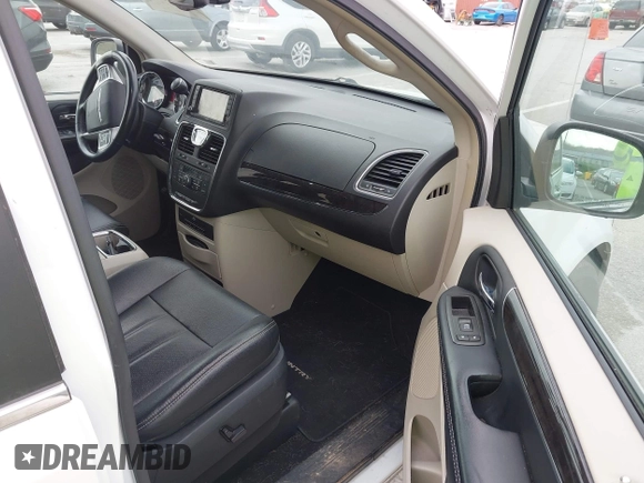 2015 Chrysler Town & Country Touring-L with VIN 2C4RC1CG9FR573863, listed as a IAAI auction lot 42036034 with 141,390 mi miles. Bid and sale history available at carsss.com. Image 5.