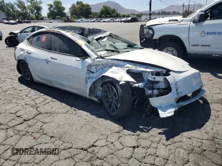 2023 Tesla Model 3 with VIN 5YJ3E1EA0PF491347, listed as a Copart auction lot 64136235 with Not provided miles and Clean title. Bid and sale history available at DreamBid. Image 4.