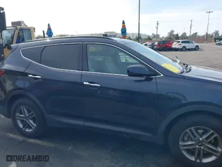 2017 Hyundai Santa Fe Sport 2.4L with VIN 5NMZU3LBXHH031228, listed as a IAAI auction lot 41812105 with 100,834 mi miles. Bid and sale history available at carsss.com. Image 14.