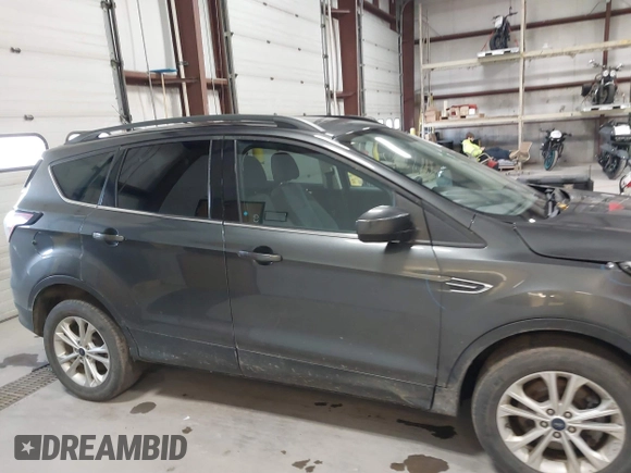 2017 Ford Escape SE with VIN 1FMCU0G92HUE10708, listed as a IAAI auction lot 41866527 with 52,370 mi miles. Bid and sale history available at carsss.com. Image 13.