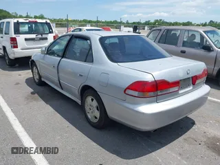 2001 Honda Accord EX z VIN 1HGCG165X1A058857, wystawiony jako IAAI lot #39264541 z przebiegiem 184 645 mil mil oraz . Historia ofert i sprzedaży dostępna na DreamBid. Obrazek 3.