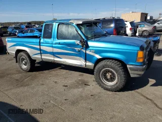 1991 Ford Ranger with VIN 1FTCR15T2MTA45652, listed as a Copart auction lot 76089874 with 90,947 mi miles and Salvage Title. Bid and sale history available at DreamBid. Image 4.