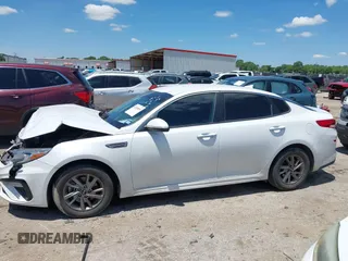 2019 Kia Optima LX z VIN 5XXGT4L38KG372576, wystawiony jako IAAI lot #42248090 z przebiegiem 98 368 mil mil oraz . Historia ofert i sprzedaży dostępna na DreamBid. Obrazek 14.