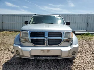 2008 Dodge Nitro SXT z VIN 1D8GU28K98W178732, wystawiony jako Copart lot #61411305 z przebiegiem 185 194 mil mil oraz Czysty tytuł • Clean title. Historia ofert i sprzedaży dostępna na DreamBid. Obrazek 5.