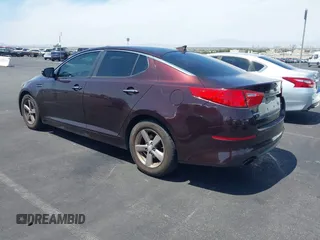 2014 Kia Optima LX with VIN 5XXGM4A77EG303496, listed as a IAAI auction lot 42572421 with 117,151 mi miles and . Bid and sale history available at DreamBid. Image 3.