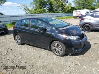 2015 Honda Fit EX-L z VIN 3HGGK5H88FM705989, wystawiony jako Copart lot #57143835 z przebiegiem 132 747 mil mil oraz Szkoda całkowita • Salvage title. Historia ofert i sprzedaży dostępna na DreamBid. Obrazek 4.