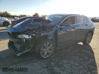 2022 BMW X2 xDrive28i with VIN WBXYJ1C04N5T58796, listed as a Copart auction lot 88723255 with 0 mi miles and Salvage Title. Bid and sale history available at carsss.com. Image 1.